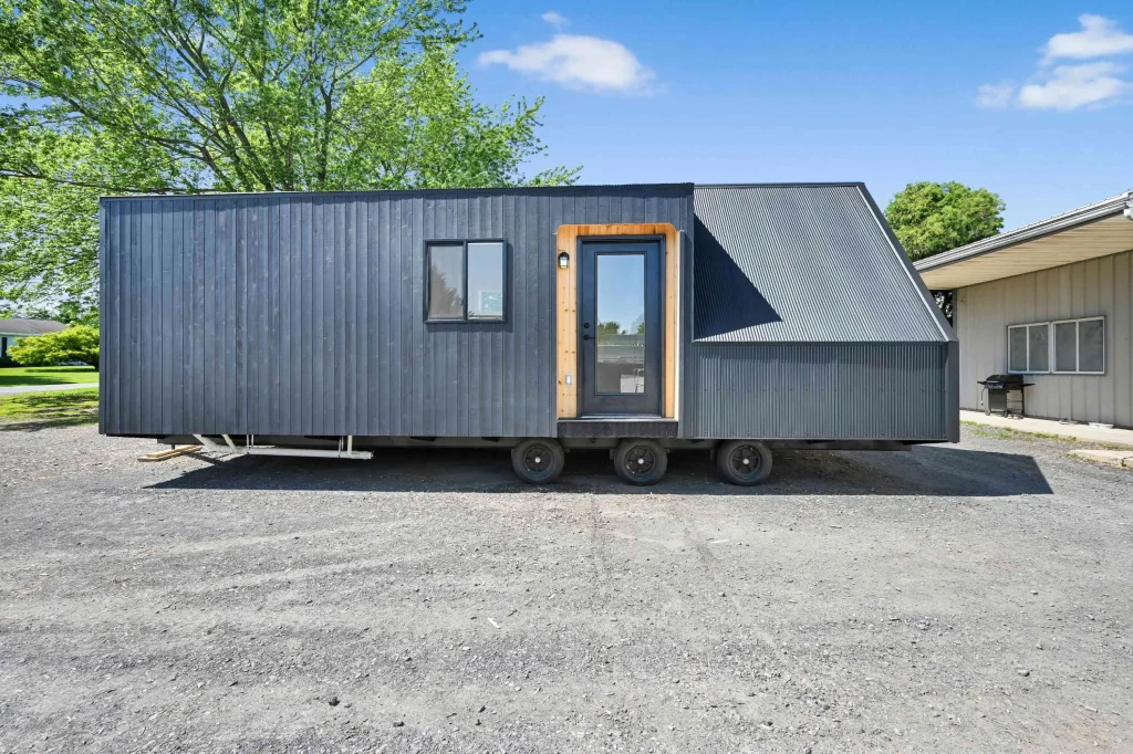 A-Frame park model cabin side exterior with matte black steel
